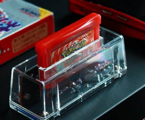 This tiny device lets you play actual Game Boy cartridges on  .